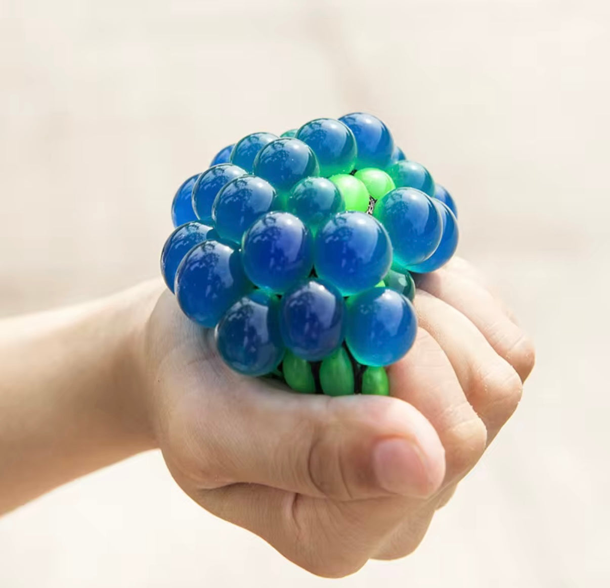 Mesh squeeze grape stress balls