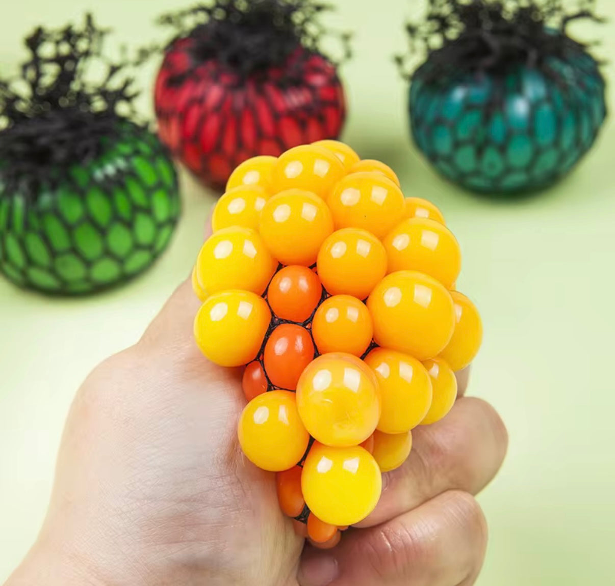 Mesh squeeze grape stress balls